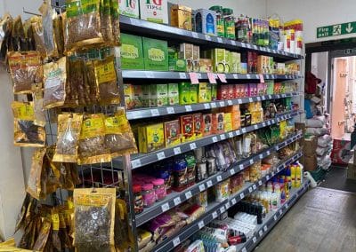 Asian Supermarket shelves, stocked with tea and other Asian products.
