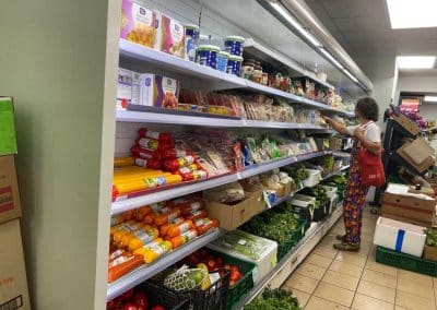 A visiting customer looking through the shelves